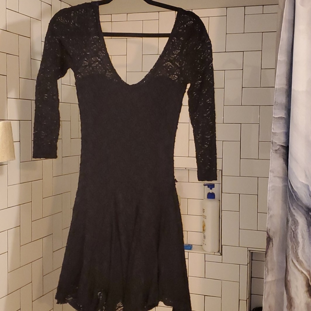 Tight black lace dress